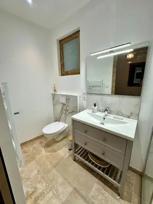 a bathroom with a sink and a toilet at L'étoile de Preixan in Preixan
