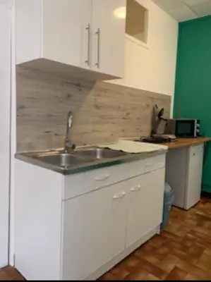 a kitchen with a sink and a counter top at Carcassonne Studio in Carcassonne