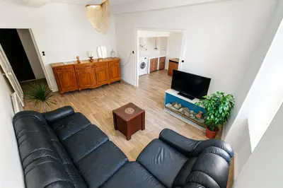 an overhead view of a living room with a couch at Appartement rénové avec 2 chambres et espace bien-être Lavelanet in Lavelanet