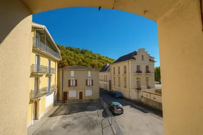 a view from a window of a street with buildings at Appartement rénové avec 2 chambres et espace bien-être Lavelanet in Lavelanet