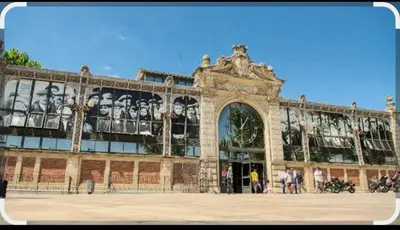 a building with a mural on the side of it at Nusa in Narbonne
