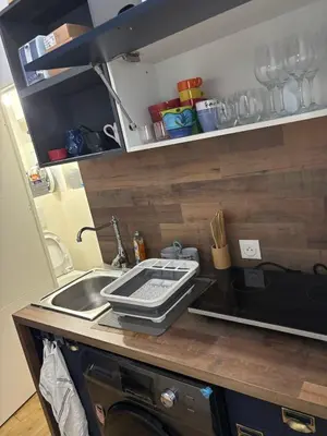 a kitchen counter top with a sink and a sink at Appartement Moderne au centre de NARBONNE in Narbonne