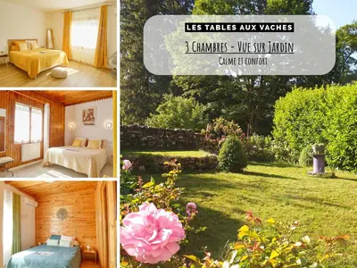 a bedroom with a bed with a book on it at Les Tables Aux Vaches à la Salvetat in La Salvetat
