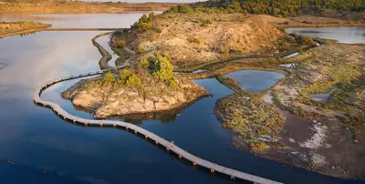 an aerial view of an island in the water at Suite Bleuet in Peyriac-de-Mer