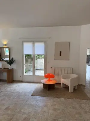 a living room with two couches and a tv at Panorama by maison bacou in Carcassonne