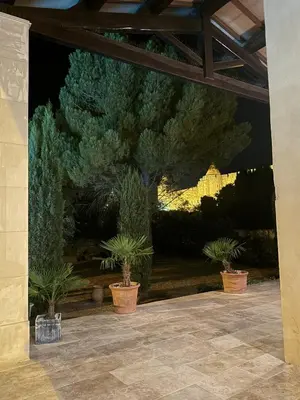 a dining room with a white table and chairs at Panorama by maison bacou in Carcassonne