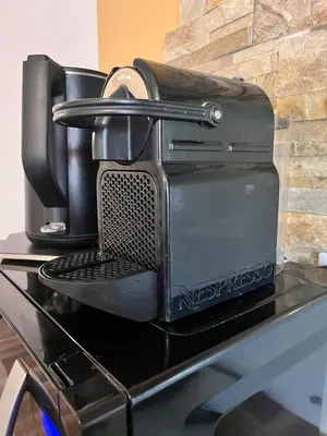 a coffee maker sitting on top of a table at Quiet house for 12 people near Cité Carcassonne in Carcassonne