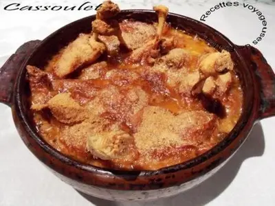 a casserole dish of food sitting on a table at La maison gourmande in Alzonne