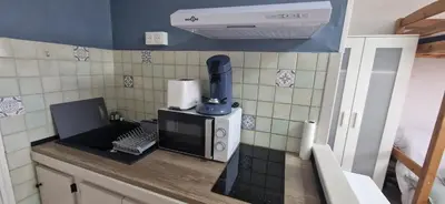 a kitchen with a counter top with a blender at Studio rénové à 70m de la plage in Port-la-Nouvelle