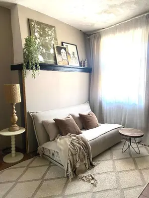 a dining room with a table and some pictures on the wall at Dreamhome B&B Limoux in Limoux