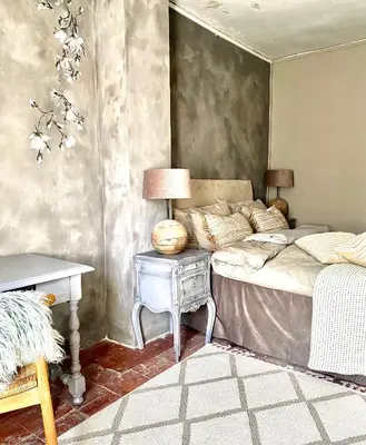 an open door to a living room with plants at Dreamhome B&B Limoux in Limoux
