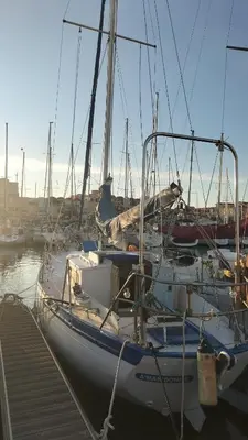 a boat docked in a marina with other boats at AMADONNe in Gruissan