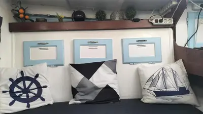 a group of pillows sitting on a wall with at AMADONNe in Gruissan