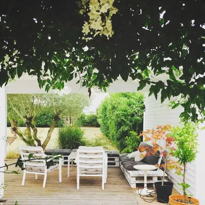 a dining room with a wooden table and chairs at Villa 39 - Ariège in Le Vernet