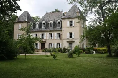 a large house with a large yard with green grass at chateaubelleauboisdormant in Cambounet-sur-le-Sor
