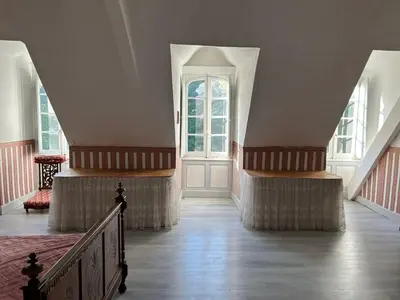 a hallway with stairs and a door in a building at chateaubelleauboisdormant in Cambounet-sur-le-Sor