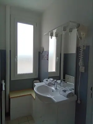 a bathroom with a sink and a mirror at Le Mauzac chambre Zen in Limoux