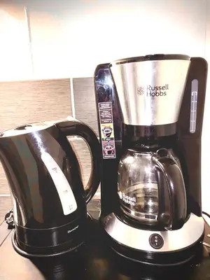 a coffee maker sitting on top of a counter at Appartement avec Patio in Carcassonne