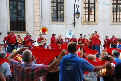 a group of people standing in front of a performance at Pyrenees,Hiking, Cycling, Rafting,Fishing,4 Bed Apartment, Roof Terrace in Quillan