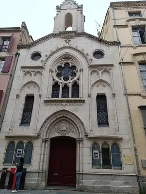 a person standing in front of a church at Good Knight Inn in Carcassonne