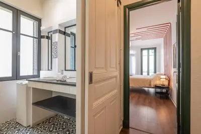 a bathroom with a sink and a mirror at 203 Balcon de la Bastide in Carcassonne