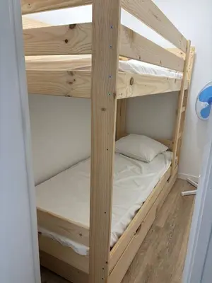 a couple of bunk beds in a room at Ondine in Gruissan