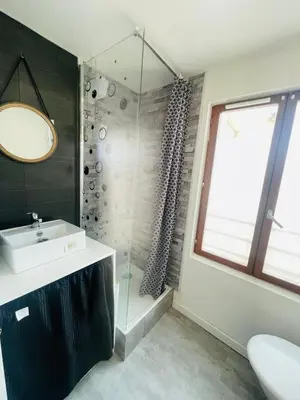 a bathroom with a sink and a shower at Studette narbonaise in Narbonne