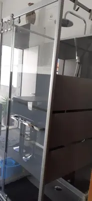 an empty desk in an office with a window at Chambre d'hôtes in Sigean