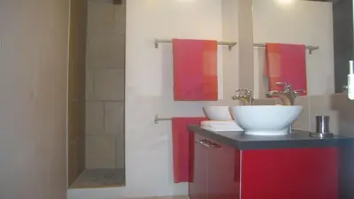 a bathroom with a sink and a shower at The Grange in Roquetaillade
