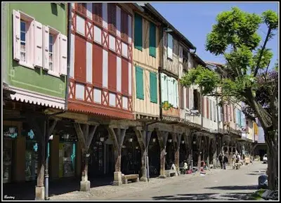 a group of buildings on the side of a street at The Studio in Roquetaillade