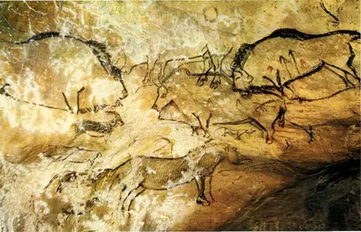 a cave painting of animals on a cave wall at The Studio in Roquetaillade