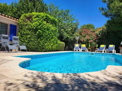 a swimming pool with lounge chairs at Villa in Saint-Couat with Private Pool in Saint-Couat-dʼAude