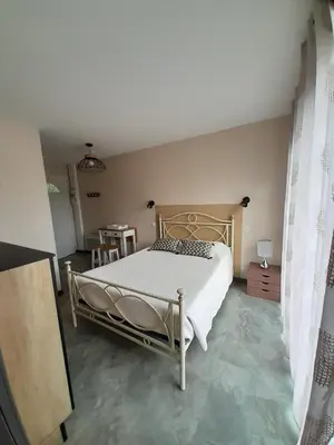 a bedroom with a bed in a room at Chabas Studio in Lagarrigue