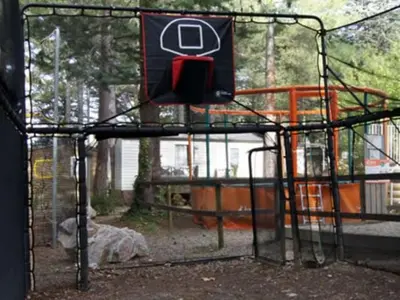 a batting cage with a sign on top of it at Mobil-Home avec Jacuzzi pour 4 personnes et Terrasse - API-1-52-465 in Sournia