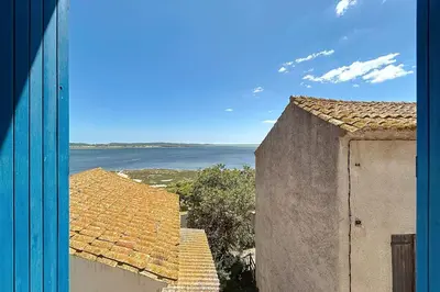 a view of the ocean from a building at Charming house with terrace and breathtaking views in Bages