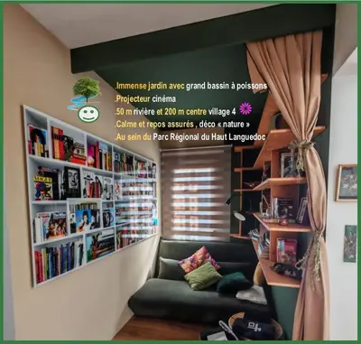 a living room with a couch and a book shelf at L'Eau Vive Villa 6 pers parc 3000m2 à 50 m de la rivière in Fraisse-sur-Agout