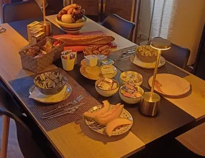 a table with a bunch of food on it at Chez Pet and Jo in Olargues