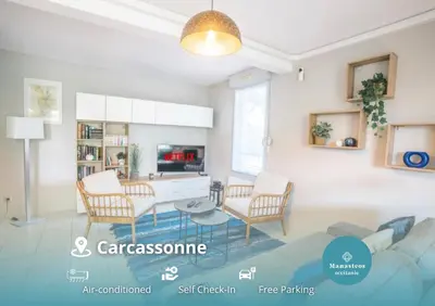 a living room with a couch and chairs and a table at Parking Sécurisé -Climatisé-Piscine-Terrasse-AM in Carcassonne