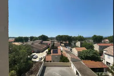 an aerial view of a town with roofs at Apartment with view quiet and comfort in Narbonne in Narbonne