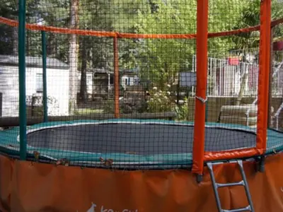 a tennis court in a batting cage at Mobil-home spacieux avec terrasse - 6 personnes - API-1-52-676 in Sournia