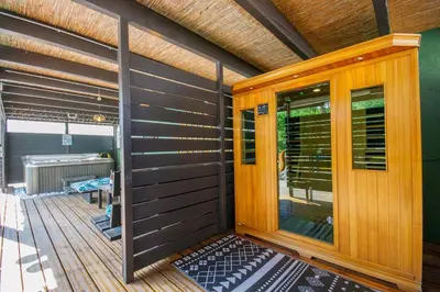 a wooden front door of a house at villa la combe blanche - toboggan aquatique privée in Pépieux