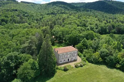 an aerial view of a house in the woods at Château de L'Encastre in Revel
