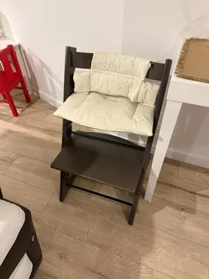 a couch sitting on a chair in a room at Confort & espace avec climatisation - T4 central in Villefranche-de-Lauragais