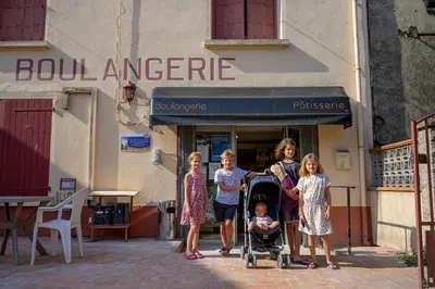 a group of people standing in front of a building at Domaine de Puychêne in Saint-Nazaire-dʼAude