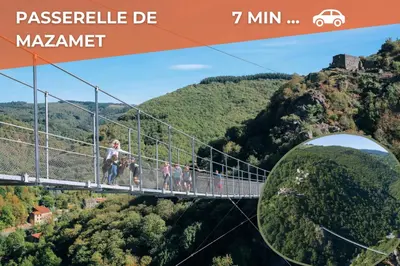 a group of people on a suspension bridge in the mountains at Le Sirocco - Studio Confort Lit Queen Size in Mazamet