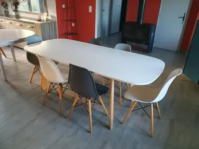 a white table and chairs in a room at Le Gîte Sambacacia in Montazels