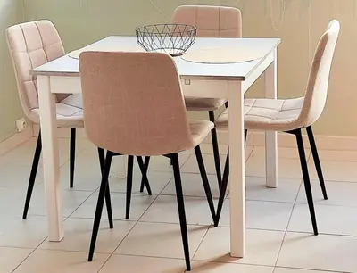 a white dining room table with four chairs at Vagues et Vignes Gruissan Corbières in Gruissan