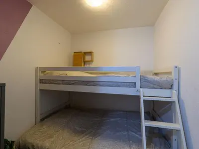 a small room with two bunk beds in it at Apartment Gruissan Port-5 by Interhome in Gruissan