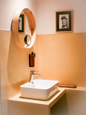 a bathroom with a white sink and a mirror at Casa Bonnafous in Villesèque-des-Corbières