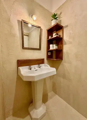 a bathroom with a sink and a mirror at La Casa De Frida charme & poésie in Narbonne